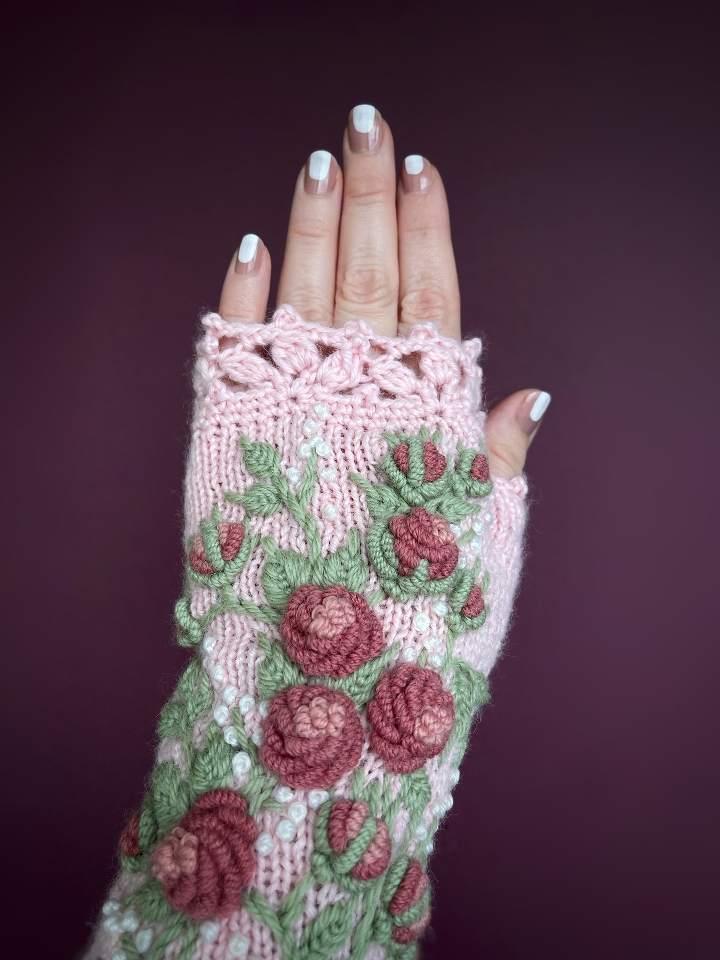 Long pink fingerless gloves with embroidered pink roses
