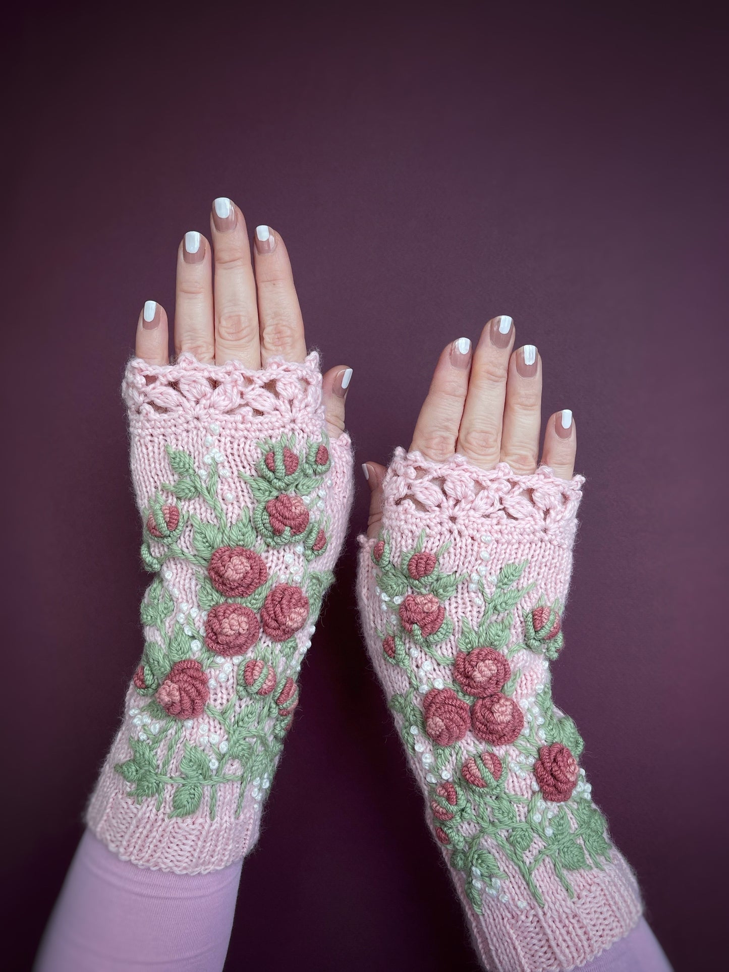 Long pink fingerless gloves with embroidered pink roses