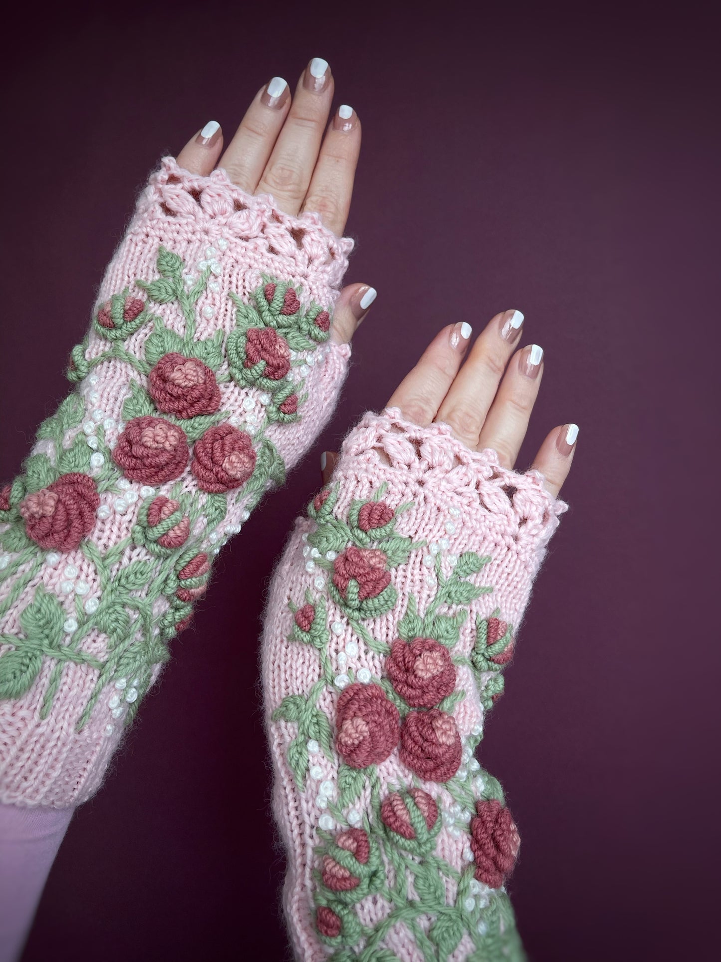 Long pink fingerless gloves with embroidered pink roses