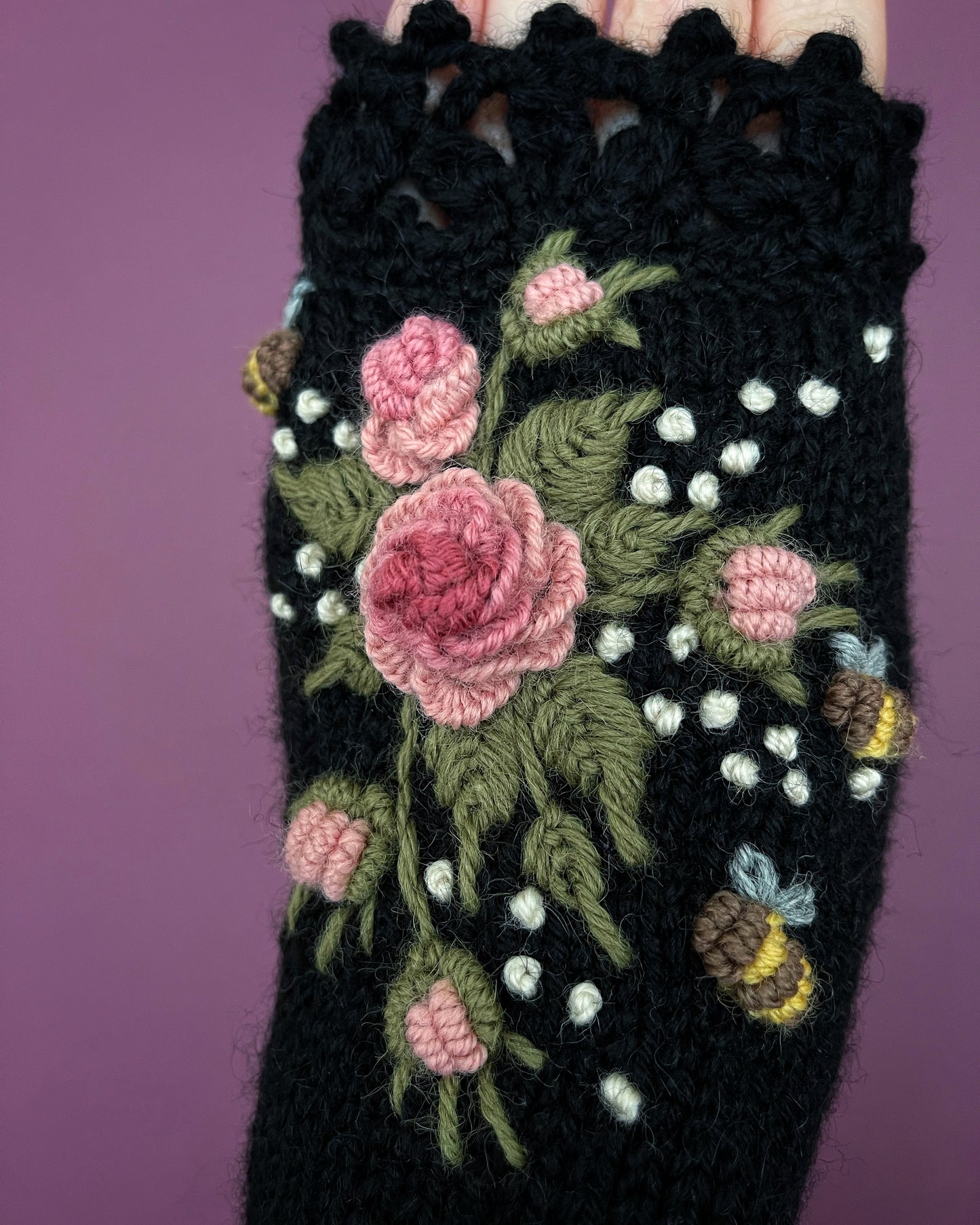 Black gloves with pink roses and bees