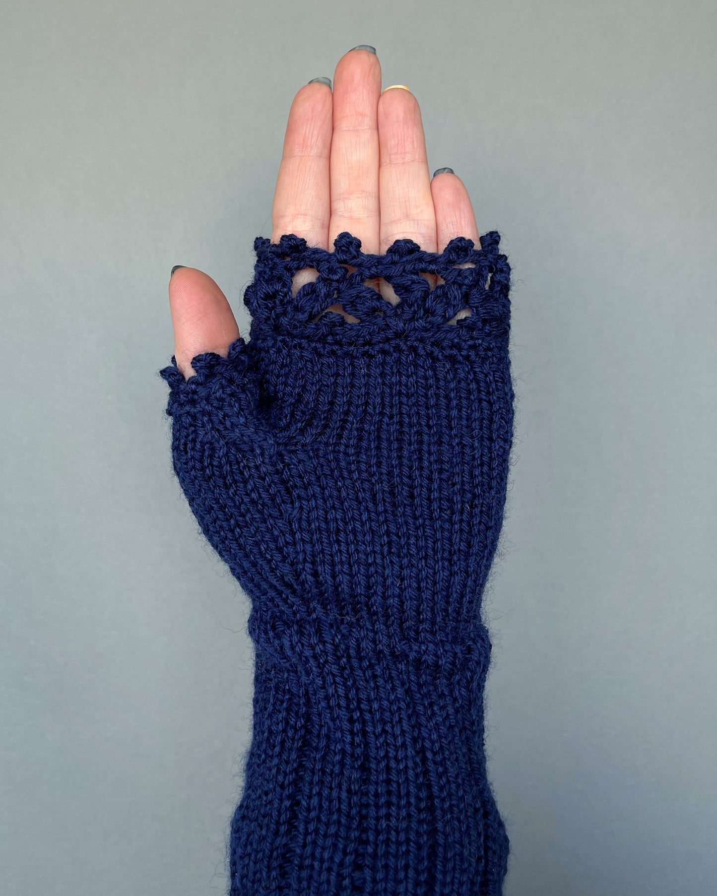 Navy blue fingerless gloves with sunflowers and bees