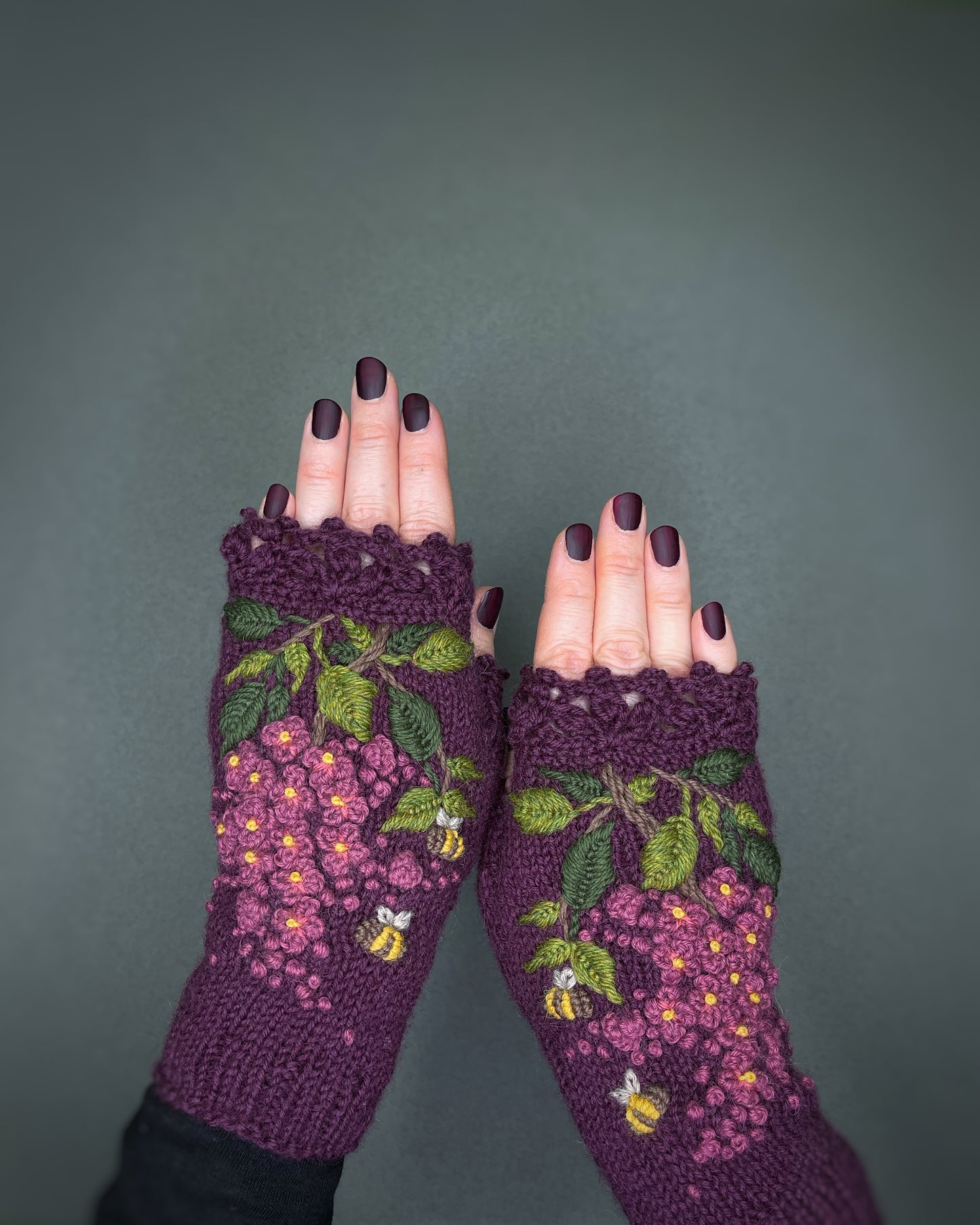 Purple gloves with lilacs and bees