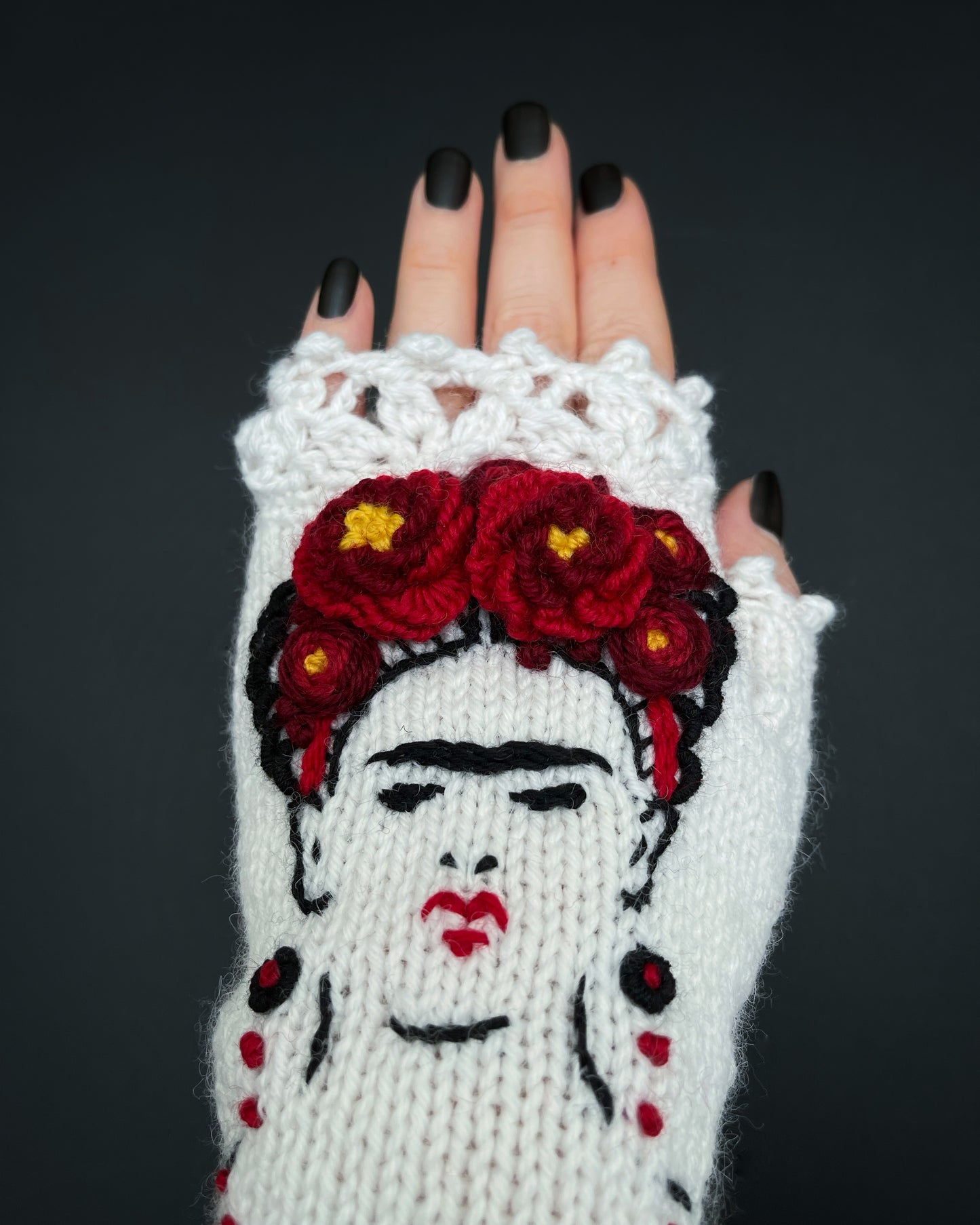 White gloves with Frida Kahlo and embroidered flowers