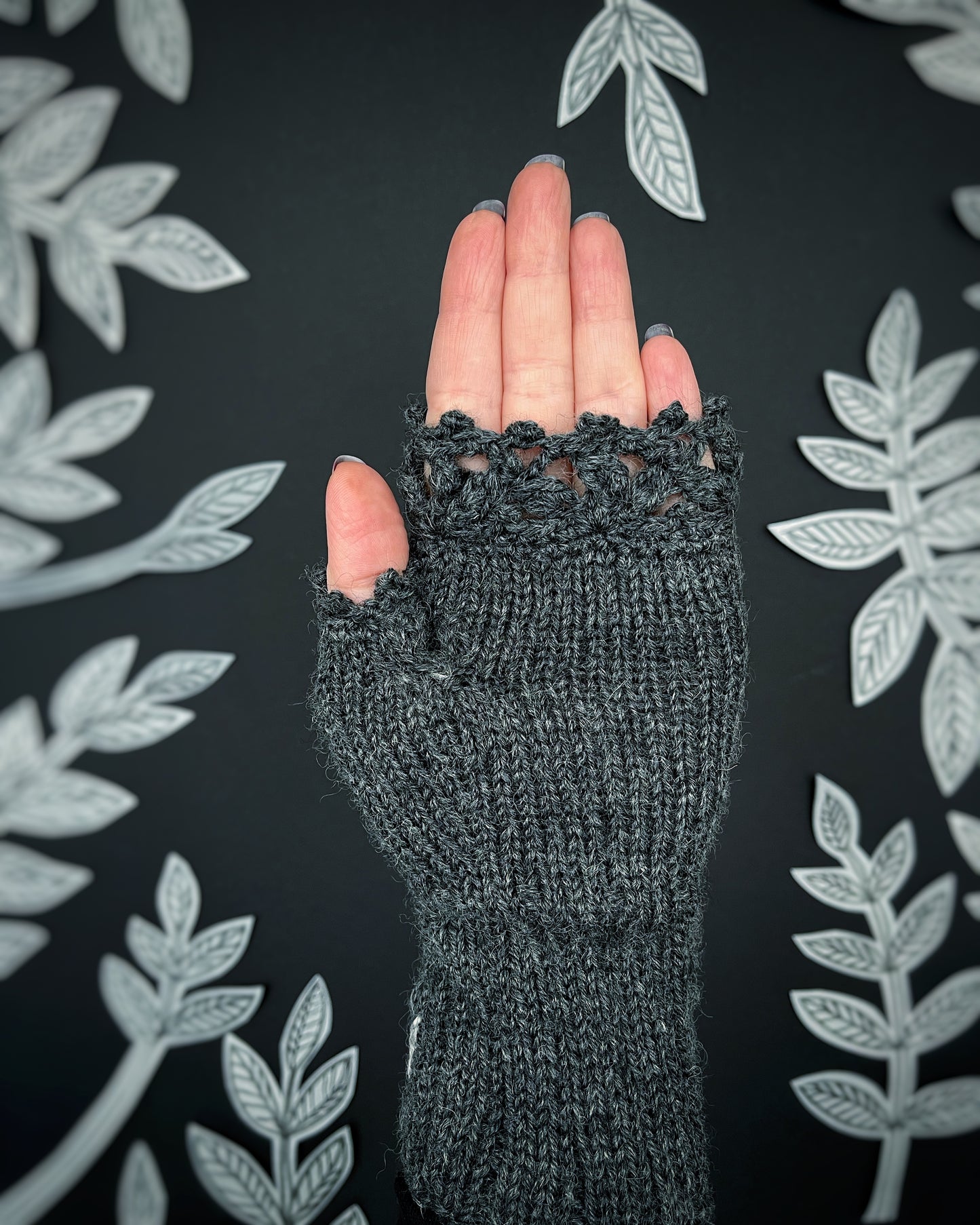 Gray gloves with hearts and leaves