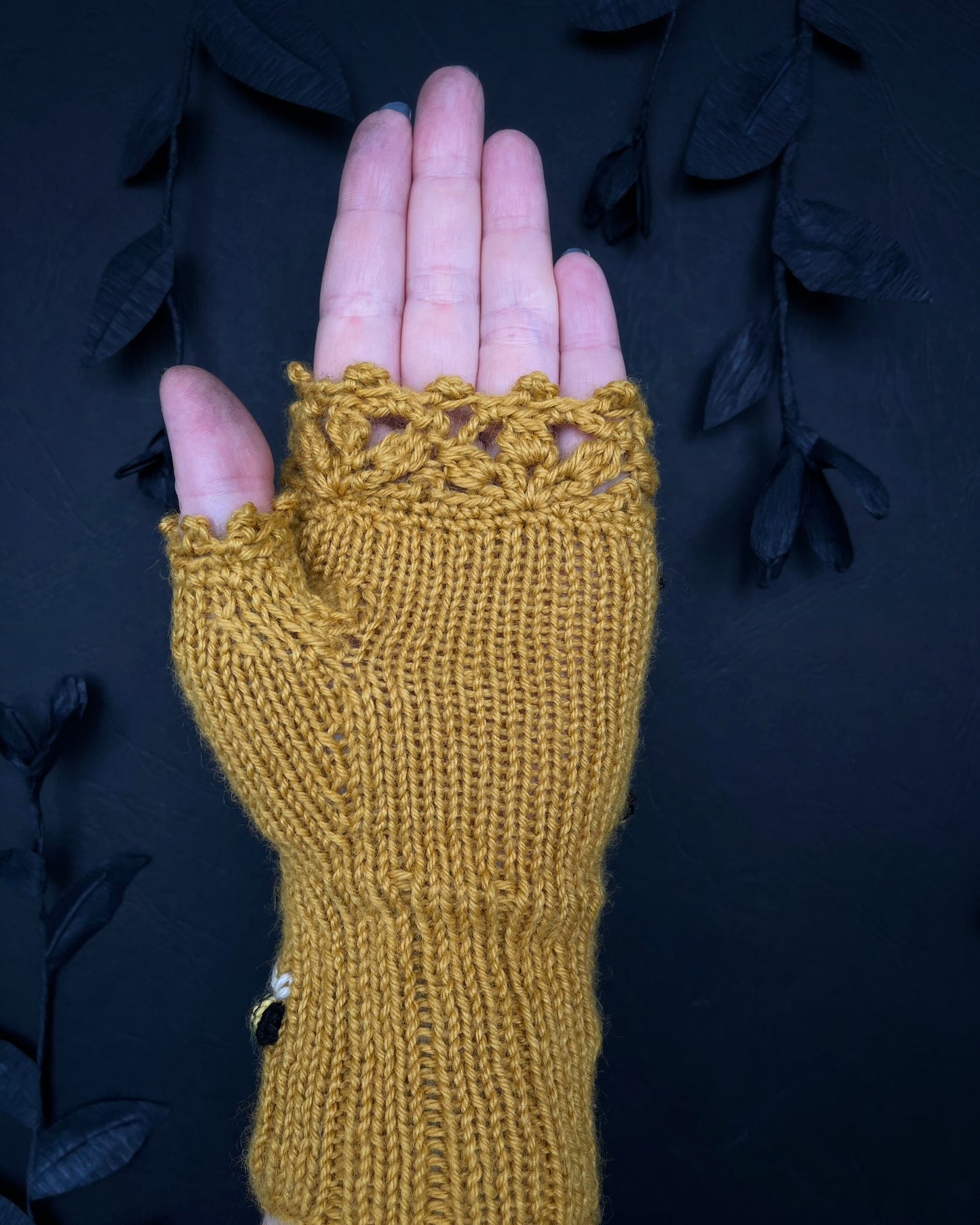 Mustard fingerless gloves with bees