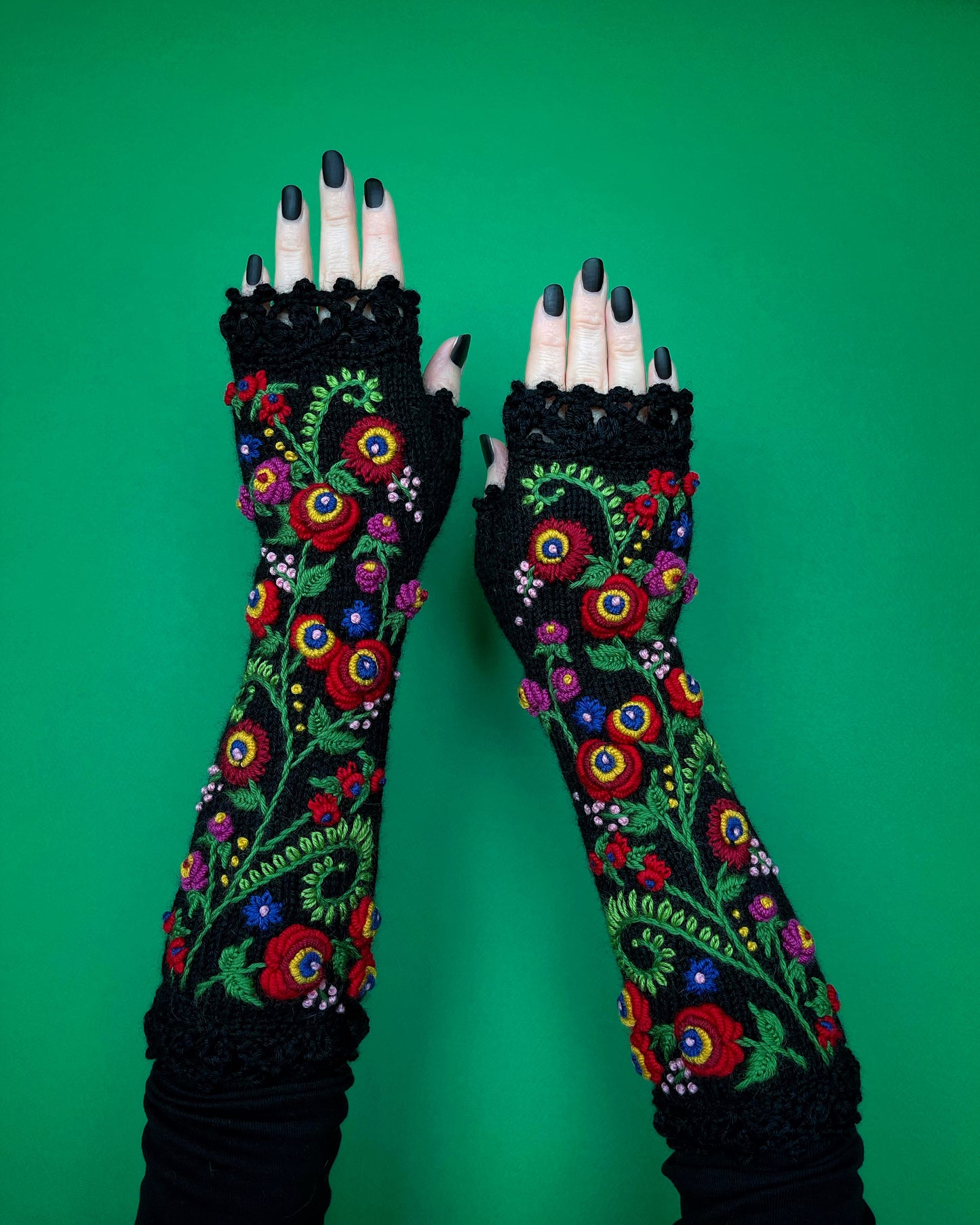 Black long gloves with brightly colored floral ornament