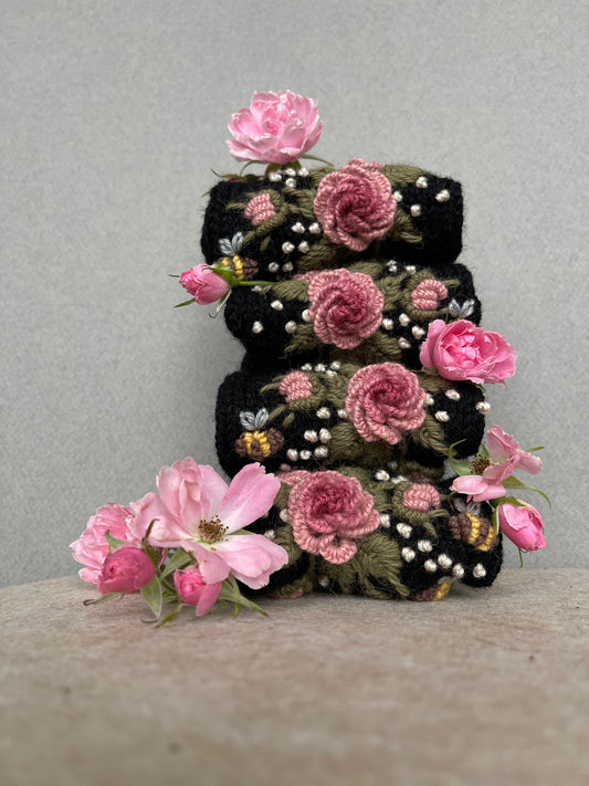 Black Victorian style gloves with pink embroidered roses and bees