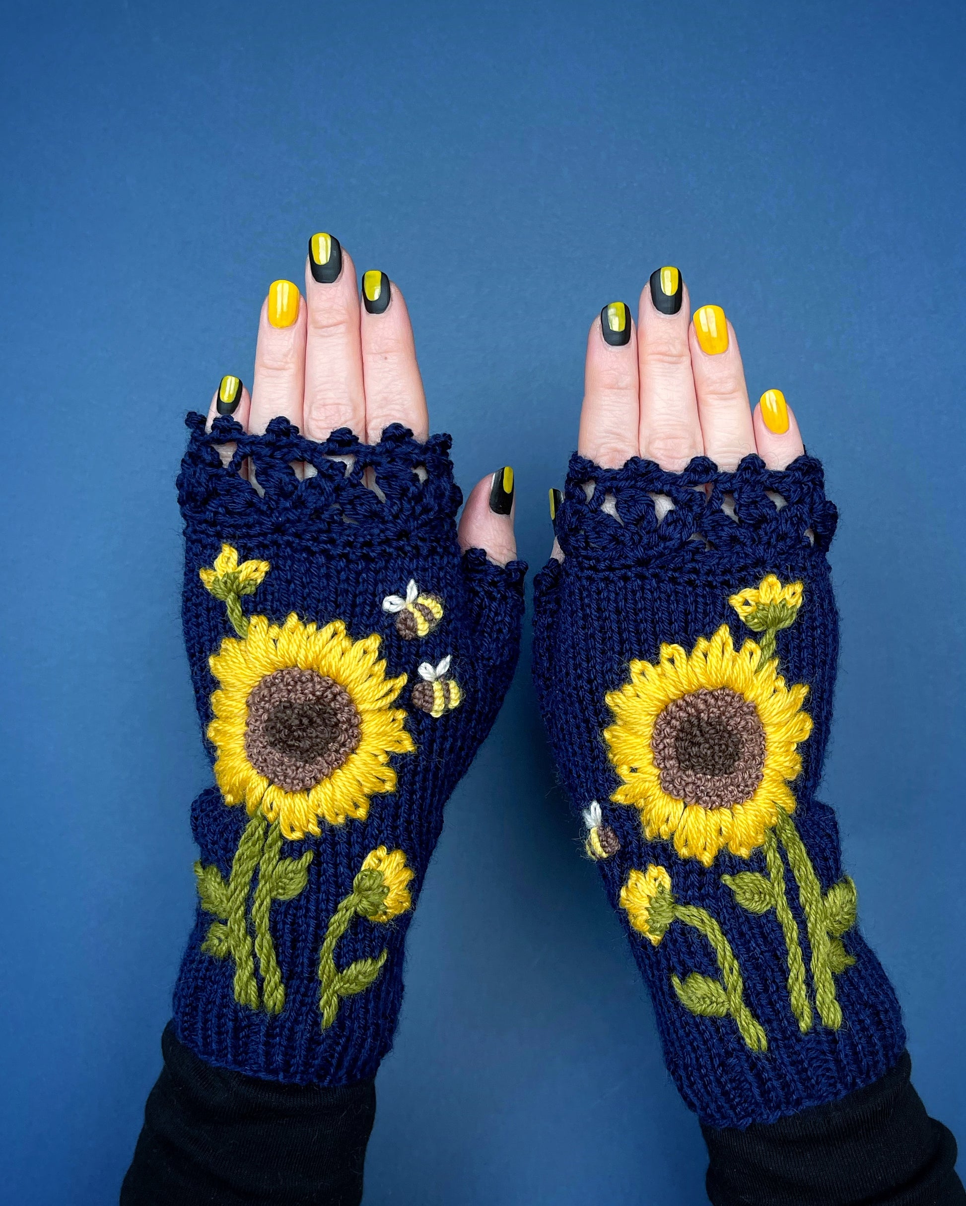 Embroidered navy blue gloves with sunflowers and bees