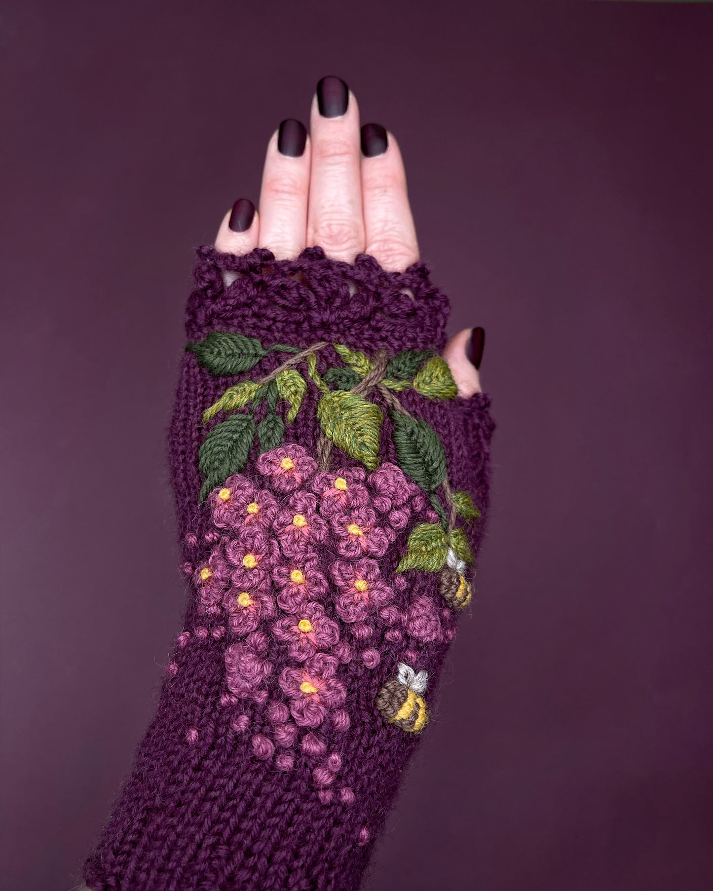 Purple gloves with lilacs and bees