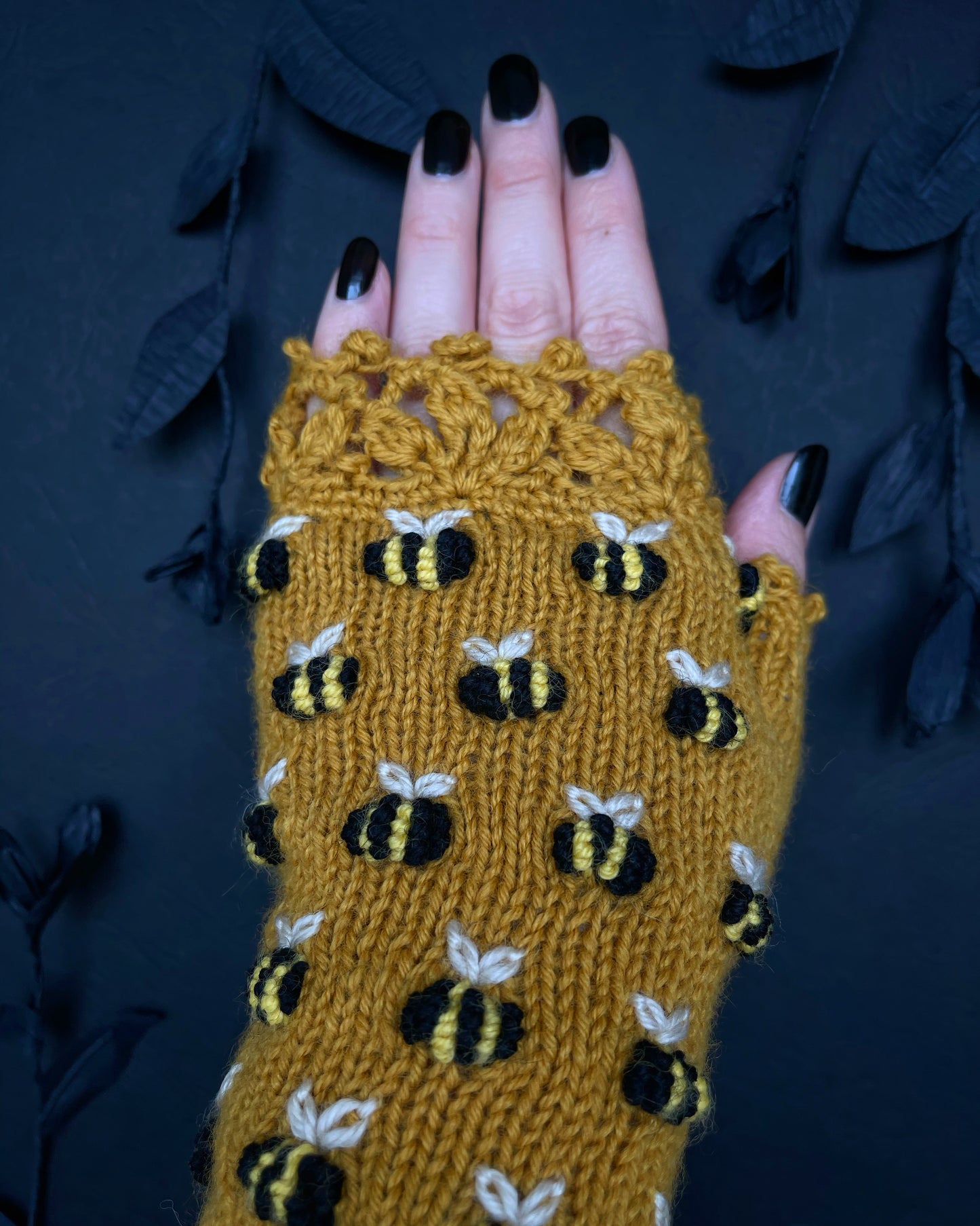 Mustard fingerless gloves with bees