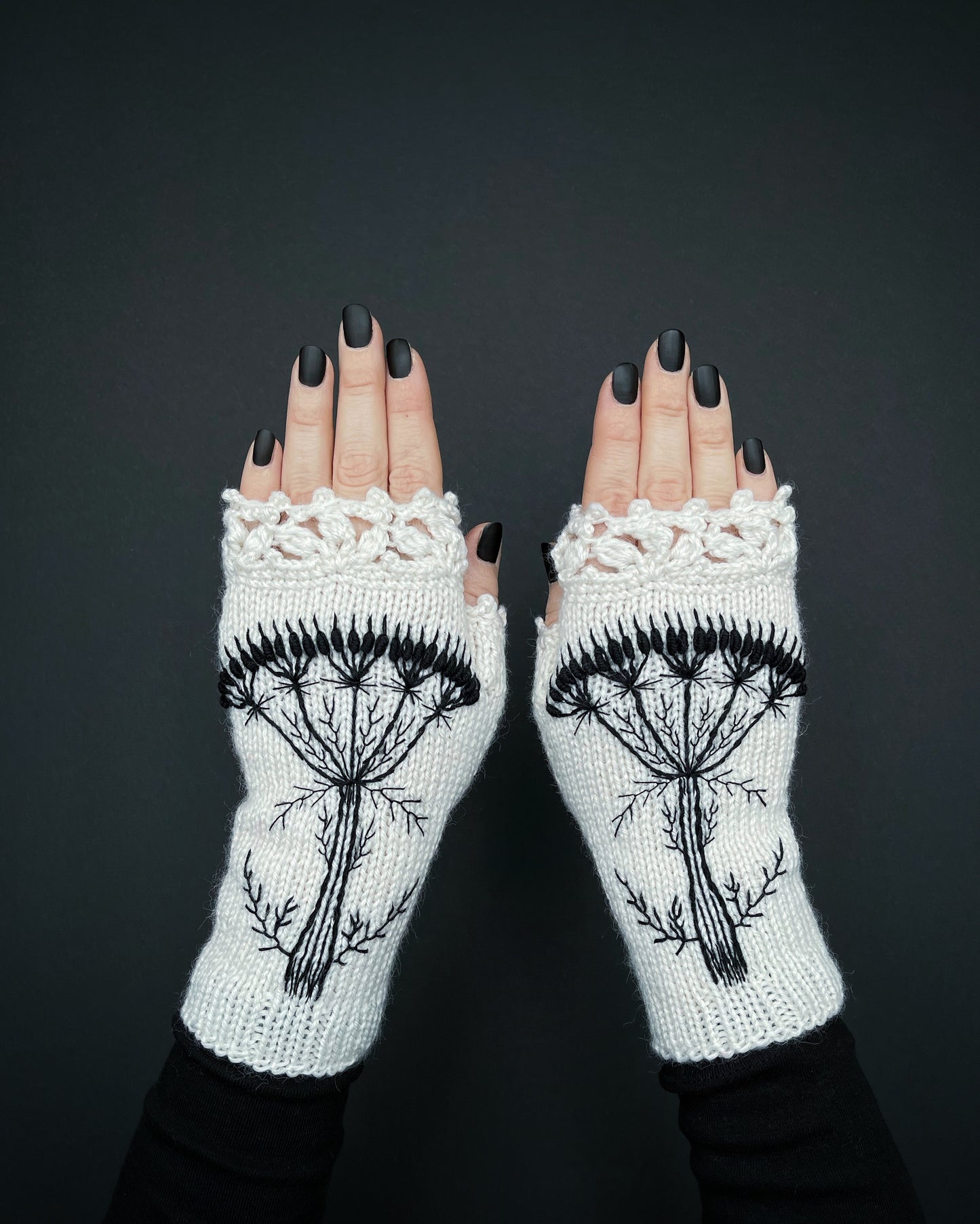 White gloves with embroidered wild flower