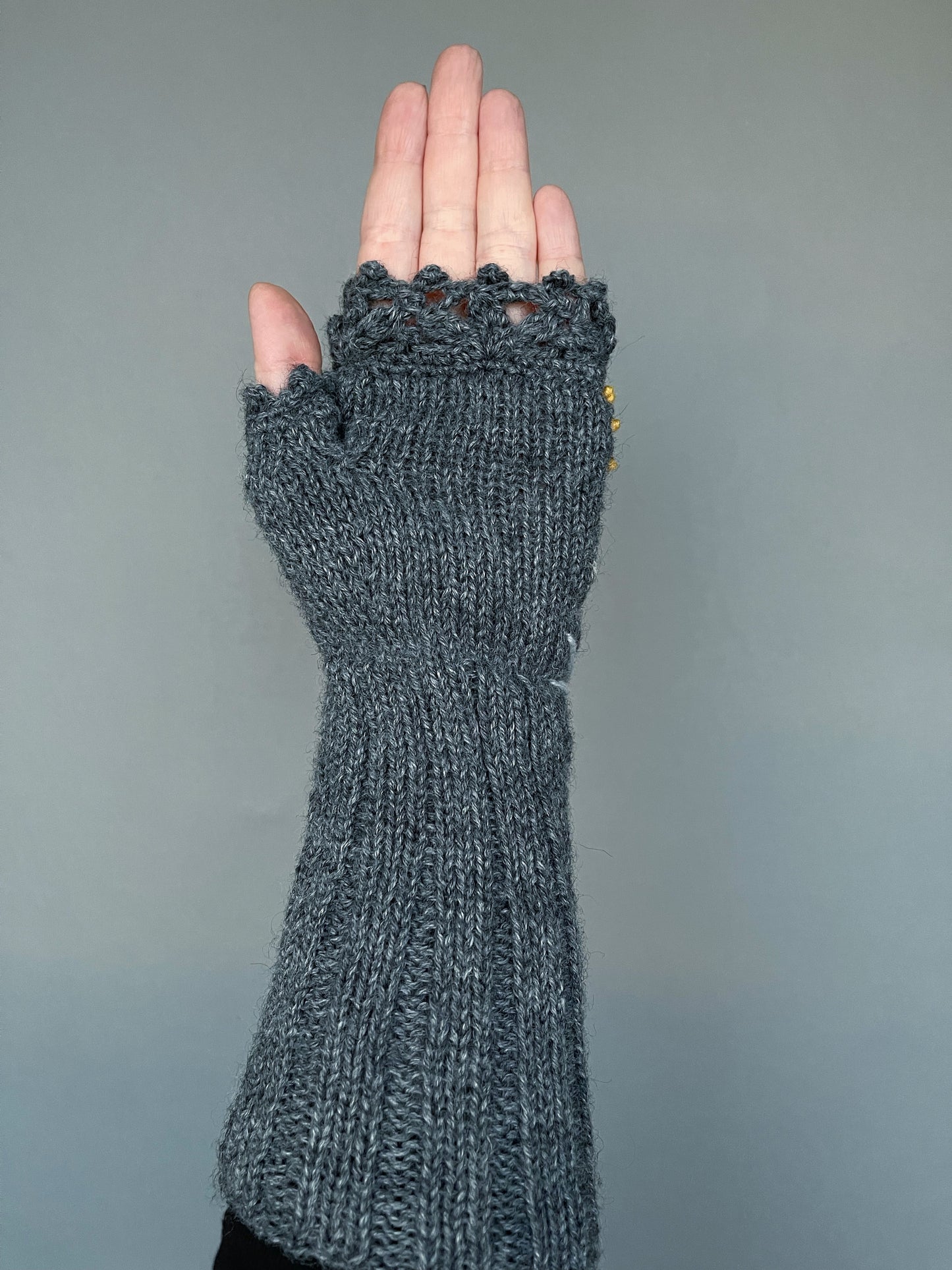 Long gray fingerless gloves with autumn trees and yellow leaves