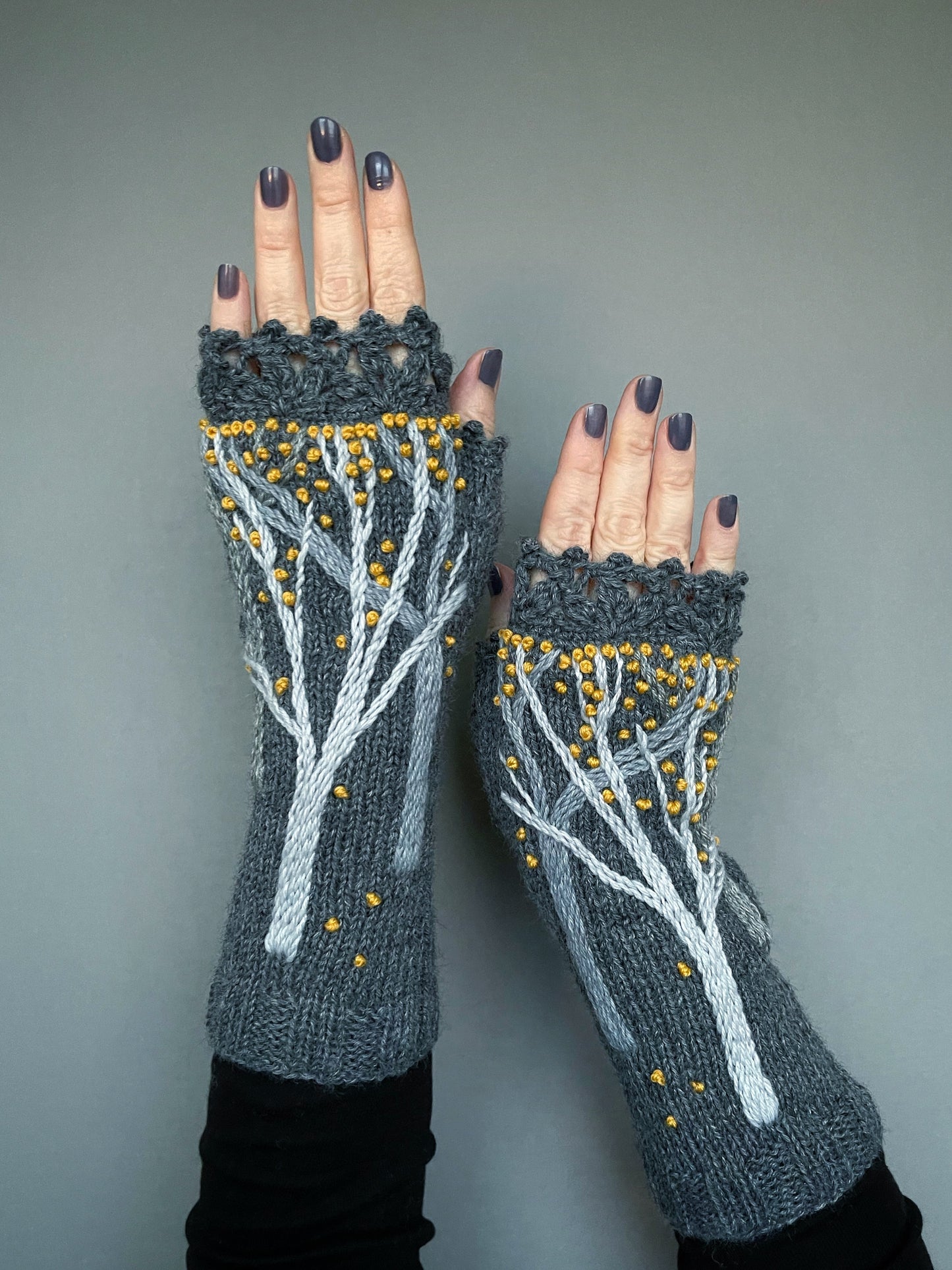 Long gray fingerless gloves with autumn trees and yellow leaves