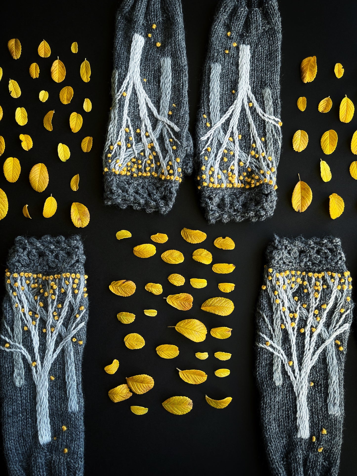 Long gray fingerless gloves with autumn trees and yellow leaves