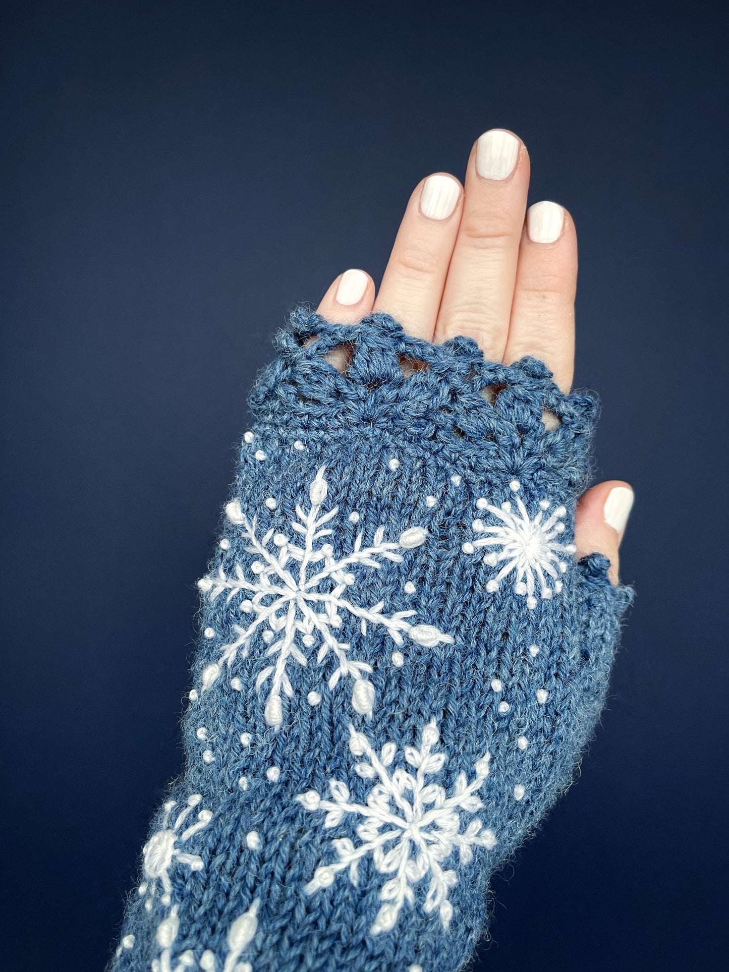 Denim blue embroidered gloves with snowflakes