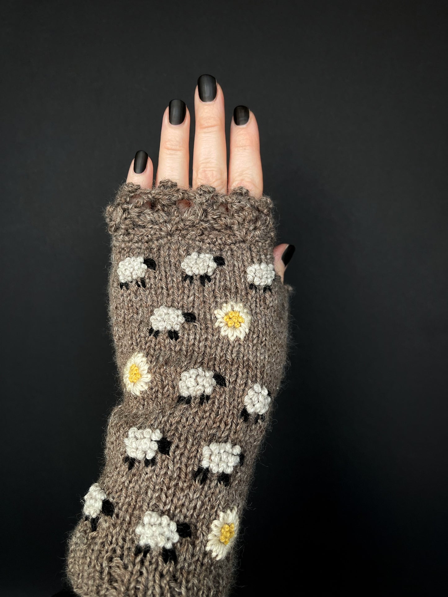 Brown embroidered fingerless gloves with sheep and daisies