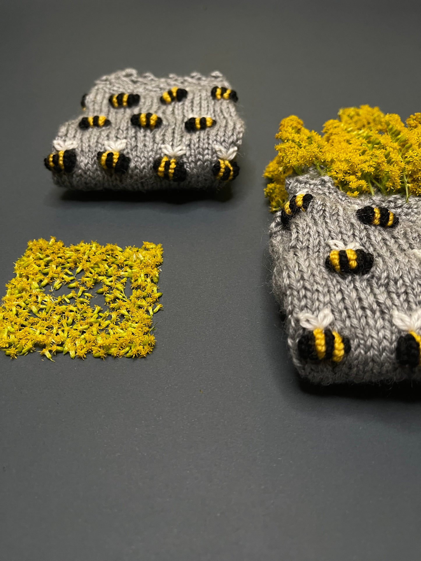 Gray gloves with embroidered bees