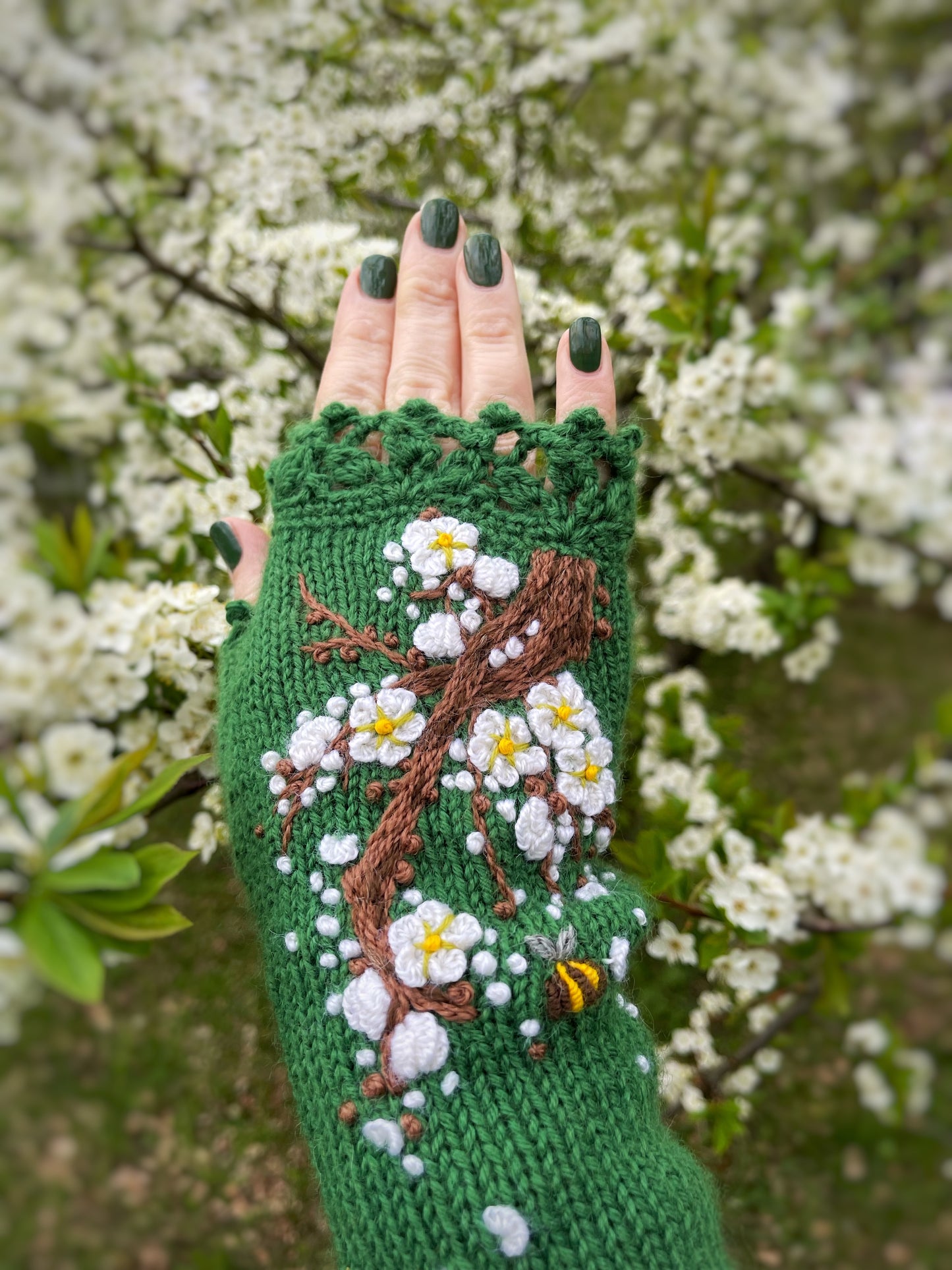 Embroidered sakura blooms green gloves