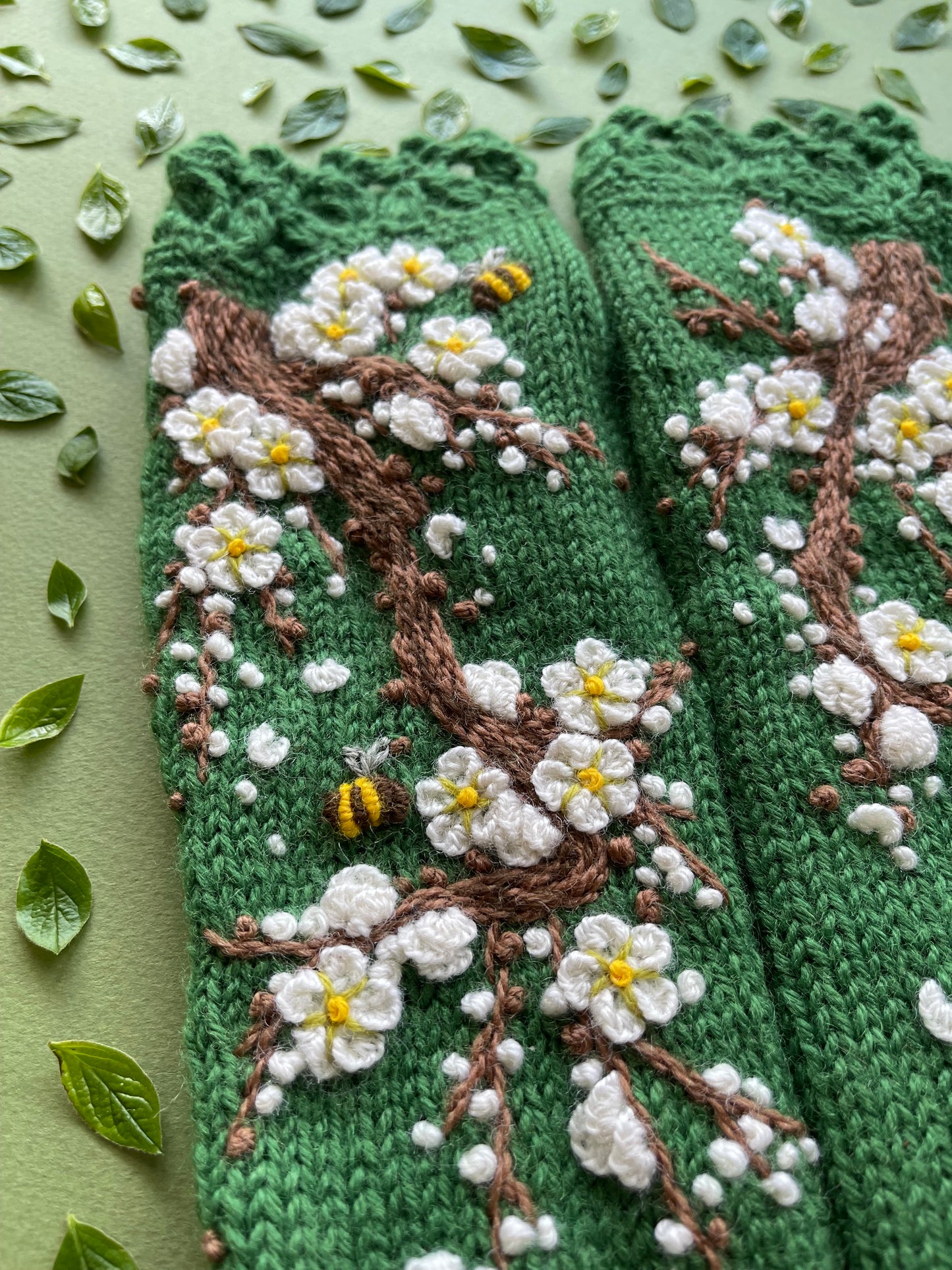 Embroidered sakura blooms green gloves